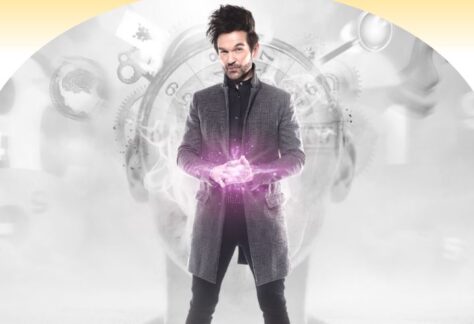 Colin Cloud with purple glowing hands for Mastermind