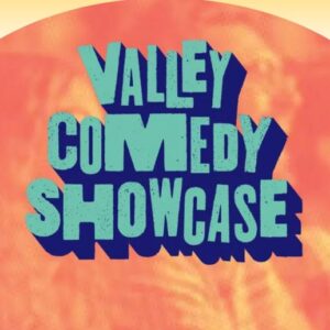 Orange and blue logo saying Vail Comedy Showcase