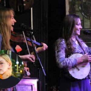 The Sopris Sisters with Rai Omri - Women onstage playing banjos