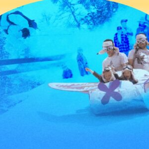 Blue photo of skiers and 2 men and 2 kids in a toboggan shaped like an airplane